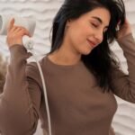 women hand on hair dryer - Hair Care